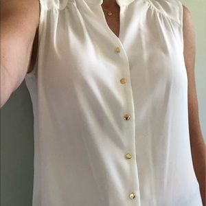 White Stitch Fix sleeveless blouse.